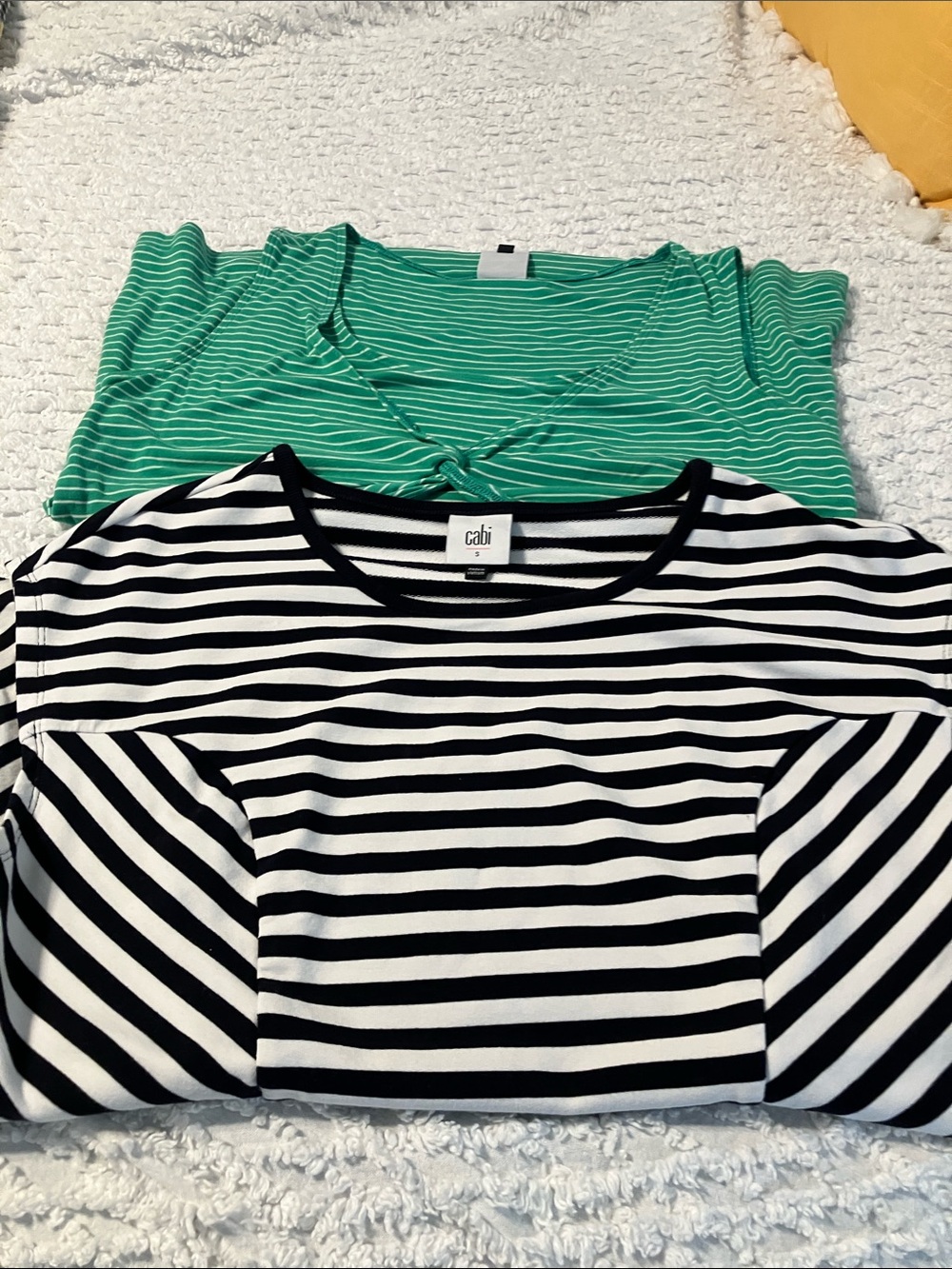 Two Cabi tops . Size small.